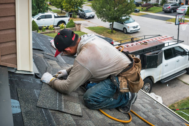 Professional Flat Roof Repair technician working in Springport, IN